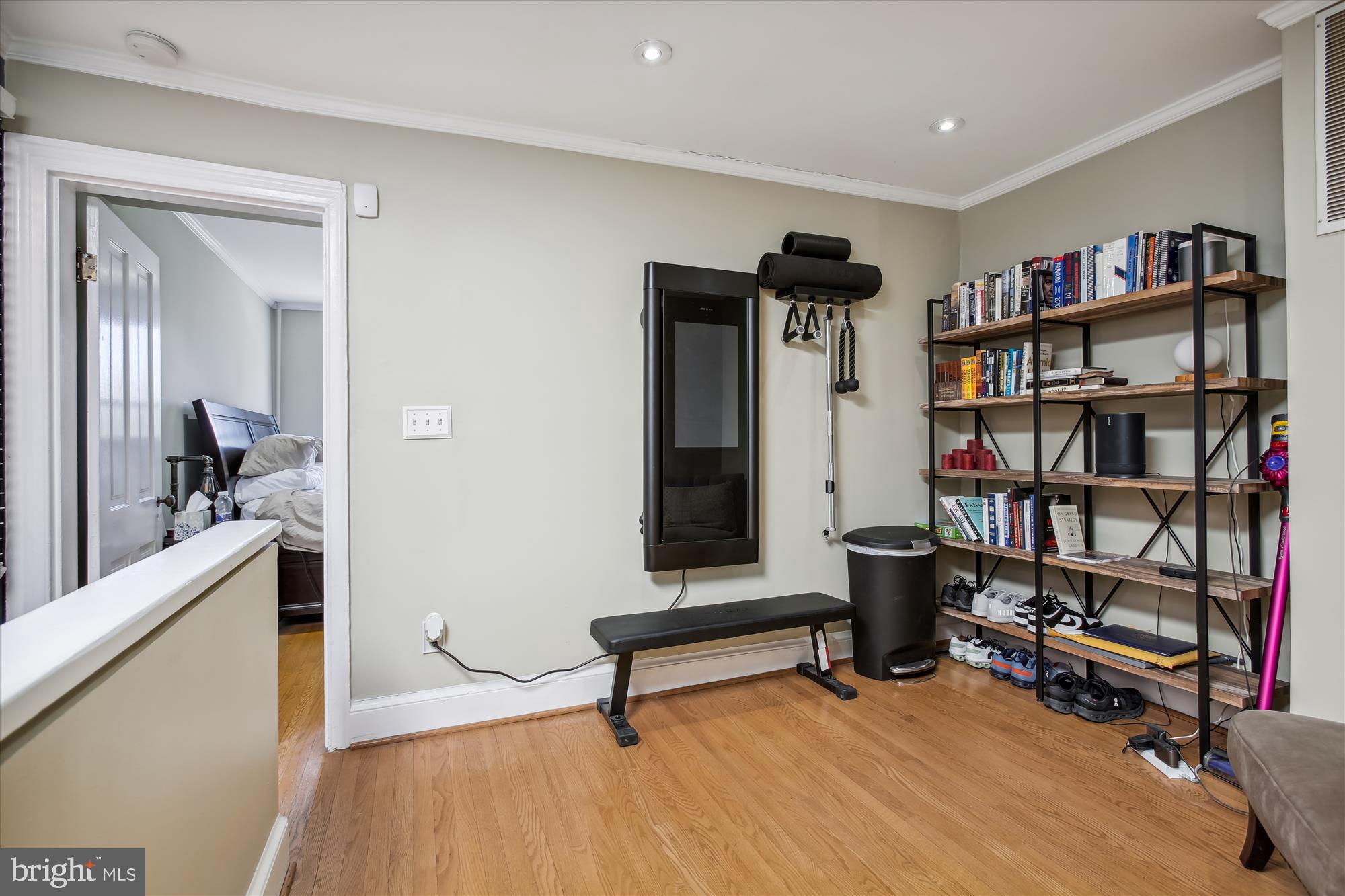 763 10th Street Southeast Washington, DC 20003 - Photo 11 of 20 a living room with furniture and a book shelf