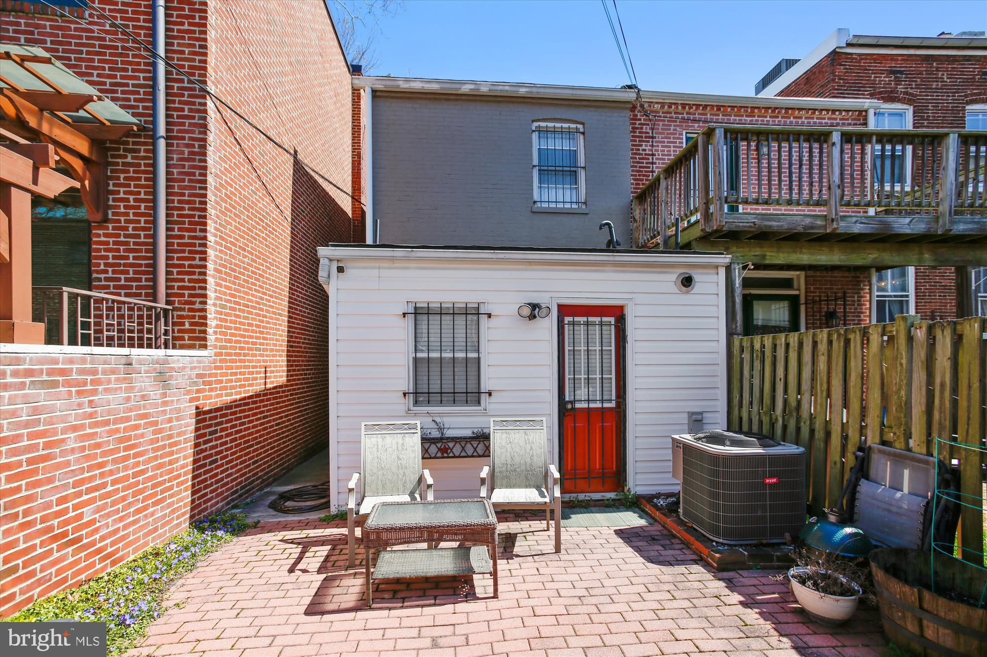 763 10th Street Southeast Washington, DC 20003 - Photo 20 of 20 a table and chairs in front of a house