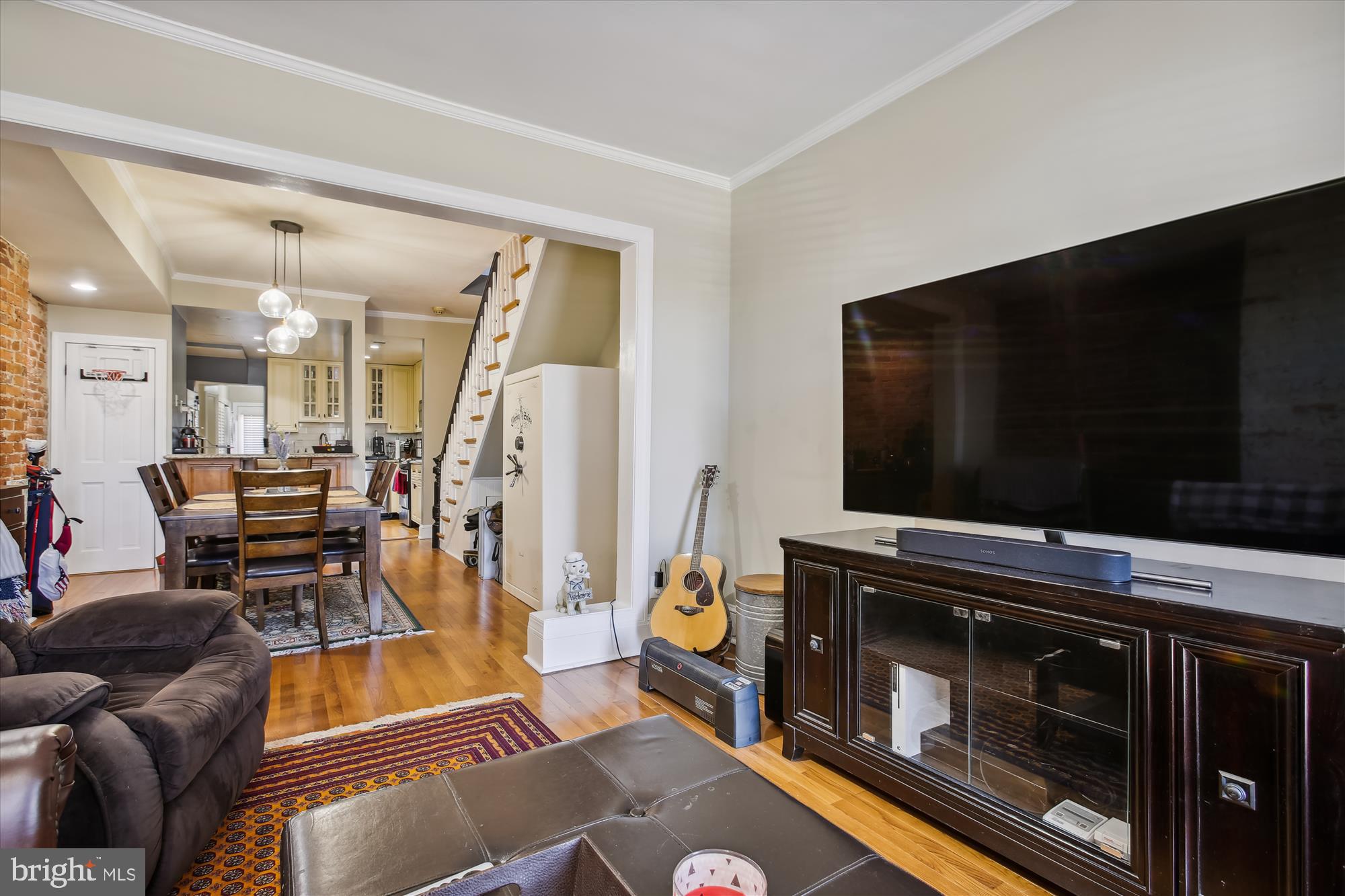 763 10th Street Southeast Washington, DC 20003 - Photo 5 of 20 a living room with furniture and a flat screen tv