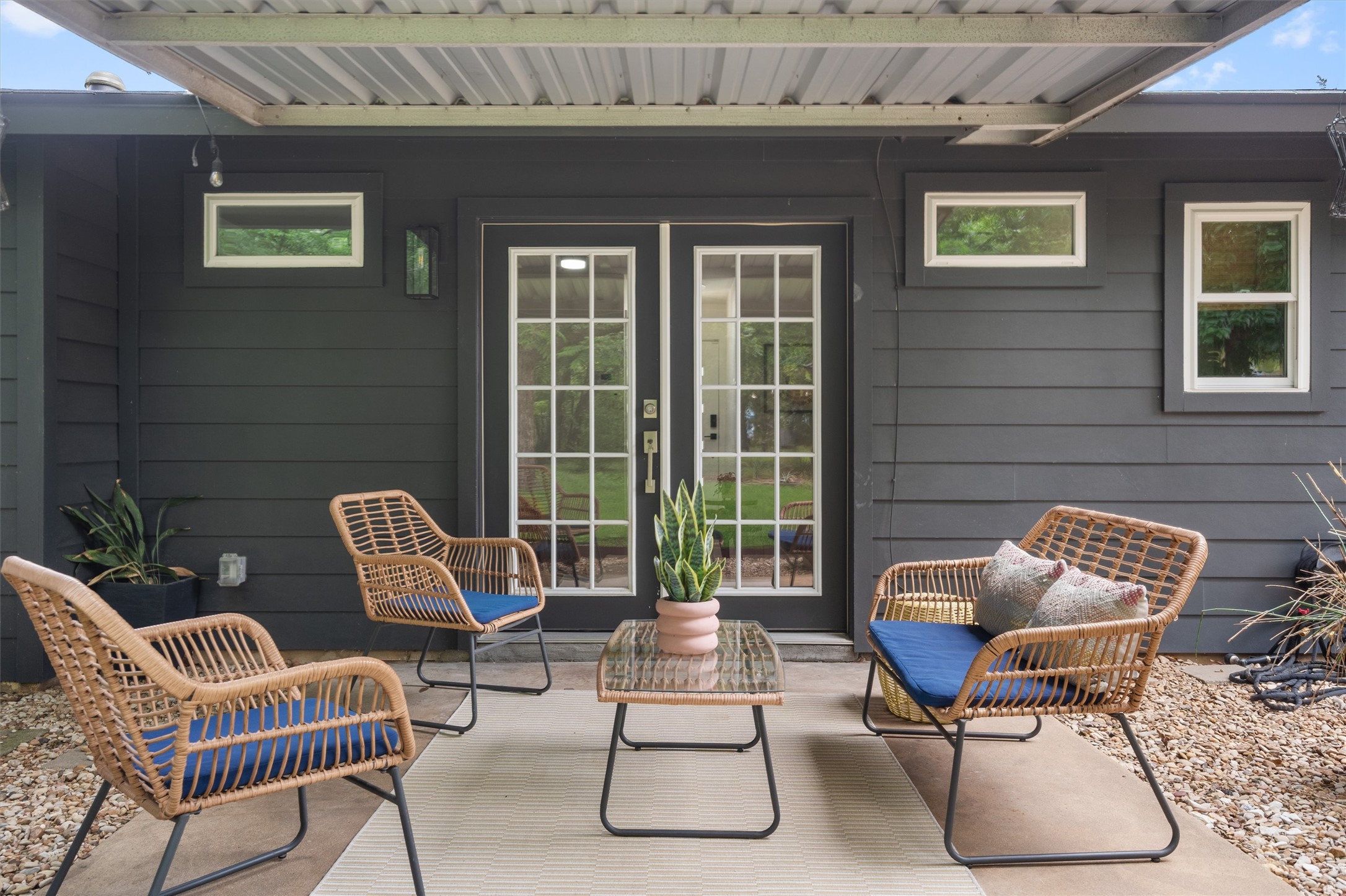 8436 Bangor Bend Austin, TX 78758 - Photo 22 of 29 A covered patio sits just off the living area, creating an easy place for morning coffee or evening dinners.