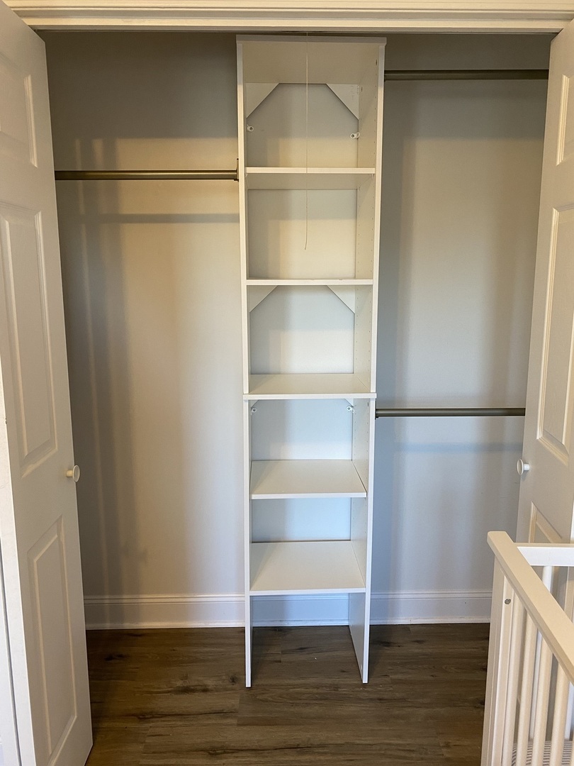 1900 Eagle Circle New Lenox, IL 60451 - Photo 13 of 16 a view of walk in closet with empty racks