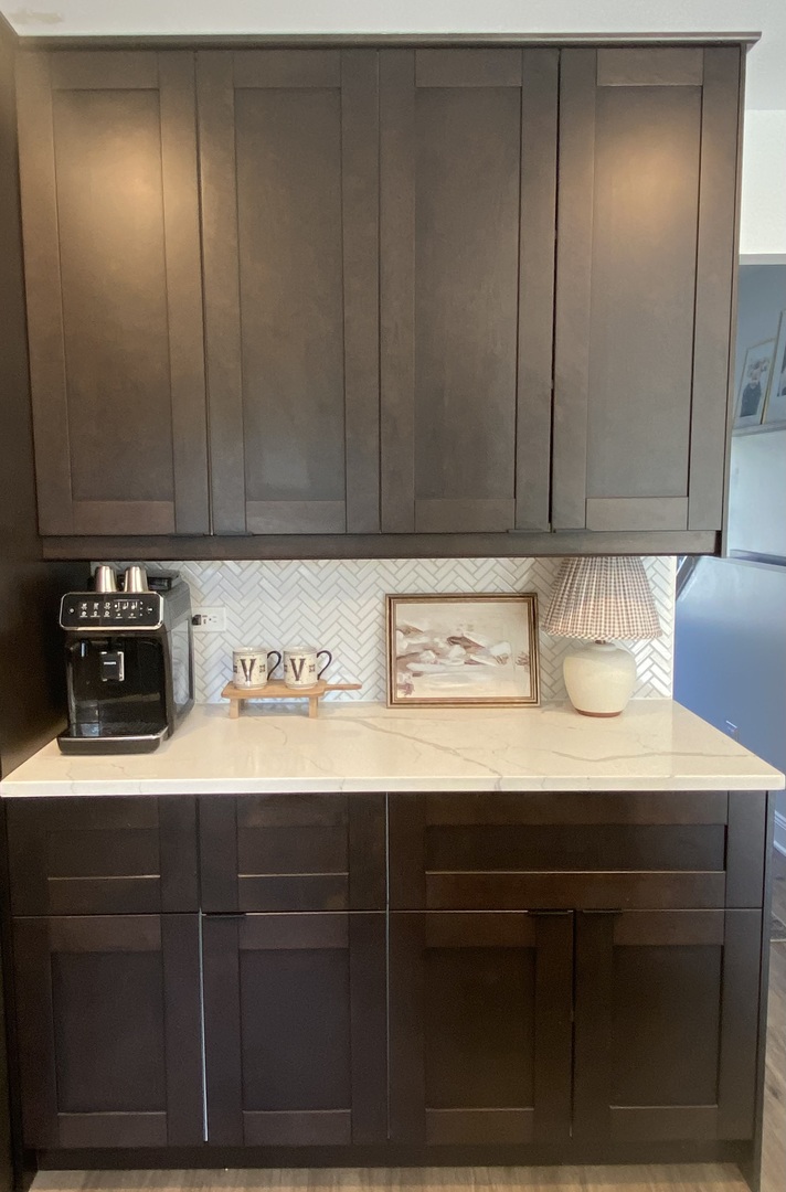 1900 Eagle Circle New Lenox, IL 60451 - Photo 5 of 16 a kitchen with a cabinets and a refrigerator