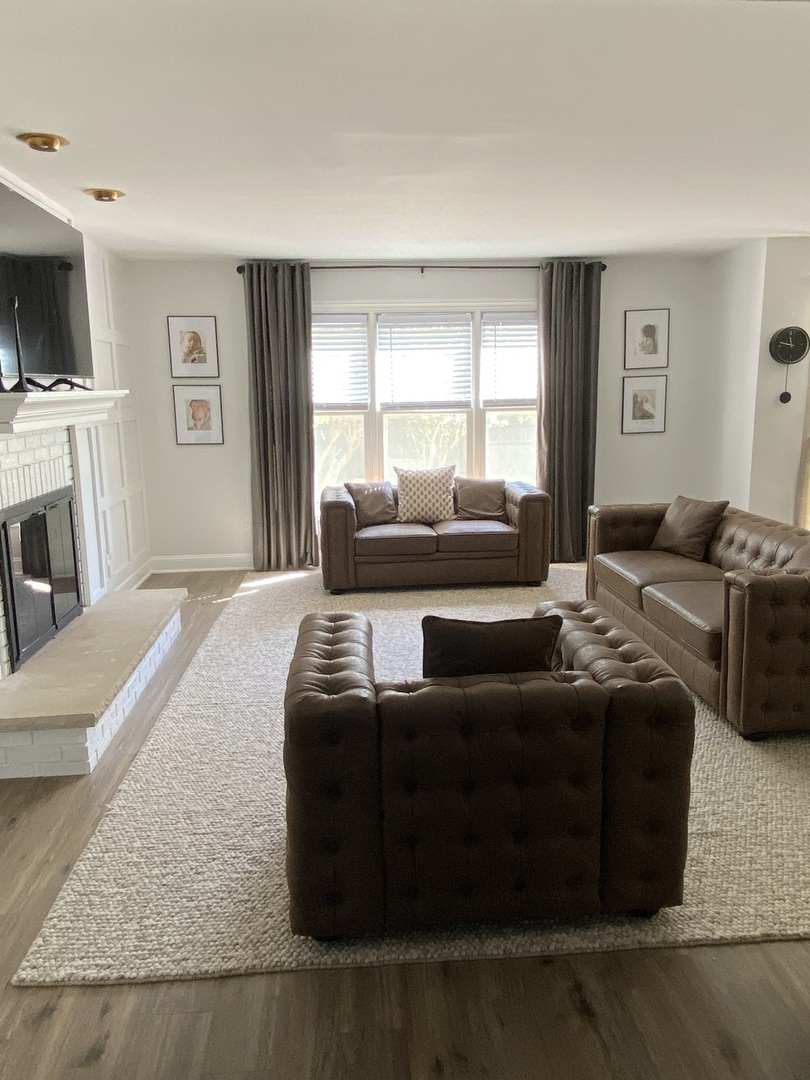 1900 Eagle Circle New Lenox, IL 60451 - Photo 7 of 16 a living room with furniture and a flat screen tv