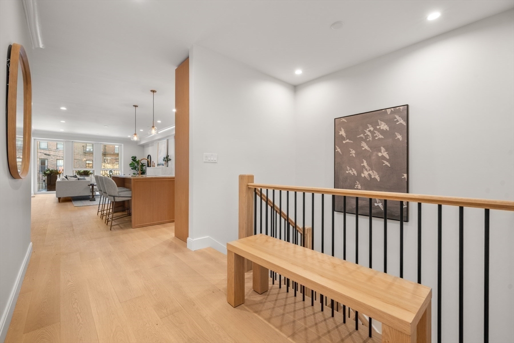 144 Worcester Street, Unit 2 Boston, MA 02118 - Photo 15 of 33 a view of a hallway with seating area