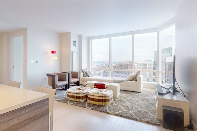 a workspace with furniture and wooden floor