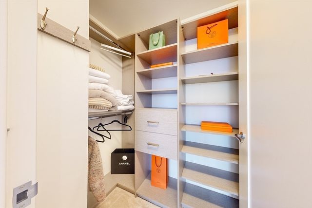 a bathroom with a double vanity sink mirror double and shower