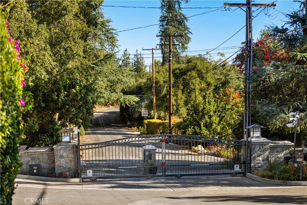 1701 Country Lane Pasadena, CA 91107 - Photo 10 of 14 a view of a house with a garden and pathway