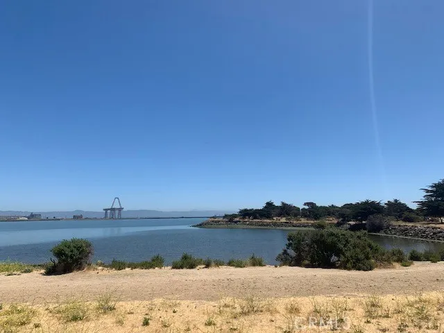 a view of lake with mountain in the background