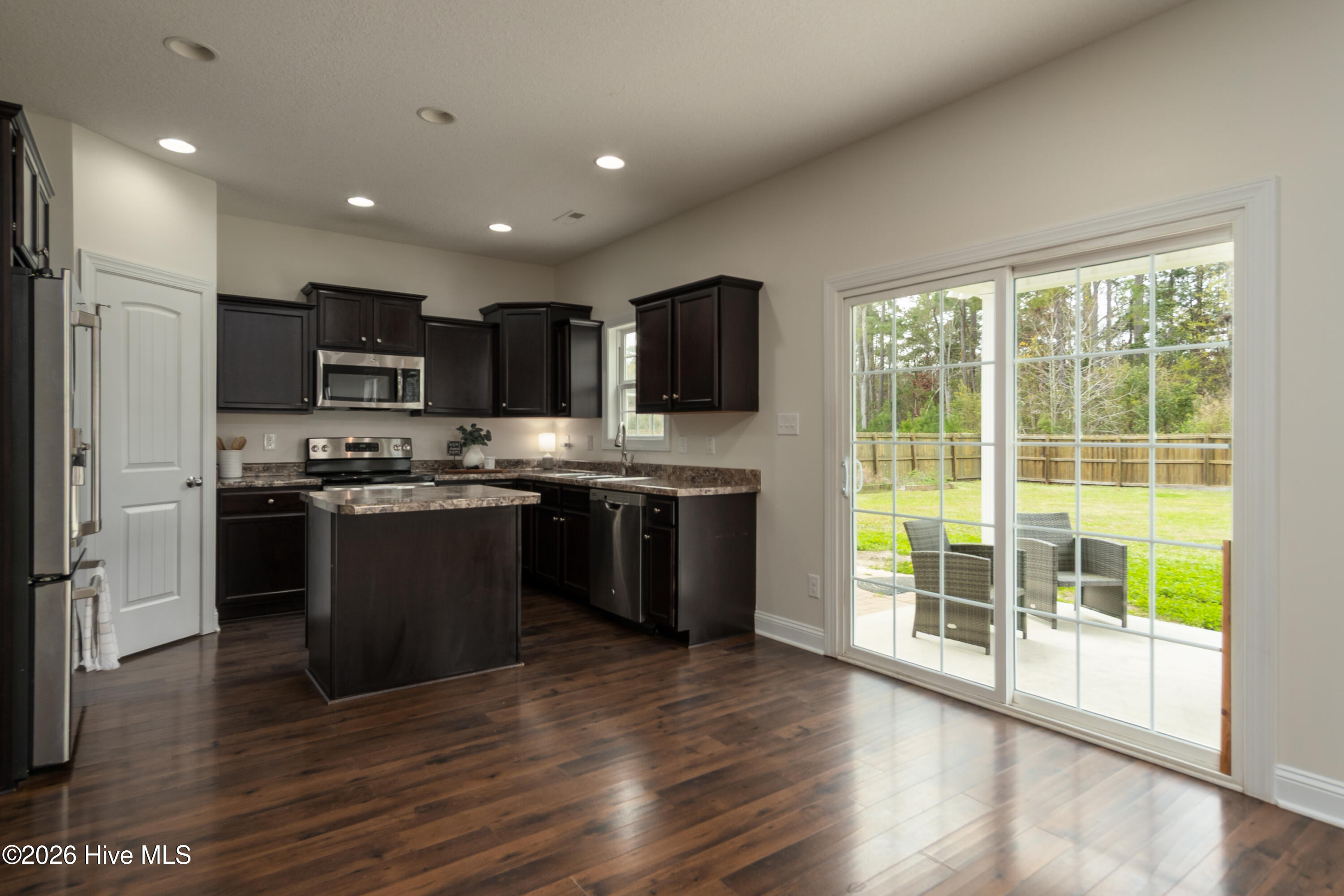 519 Stately Pines Road New Bern, NC 28560 - Photo 19 of 56 Space for another table if desired.