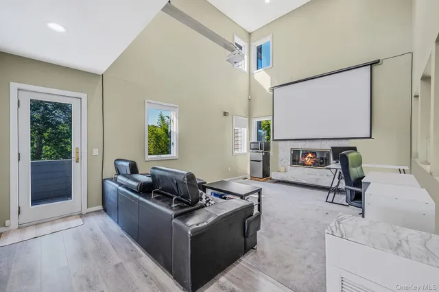 a living room with furniture and a rug