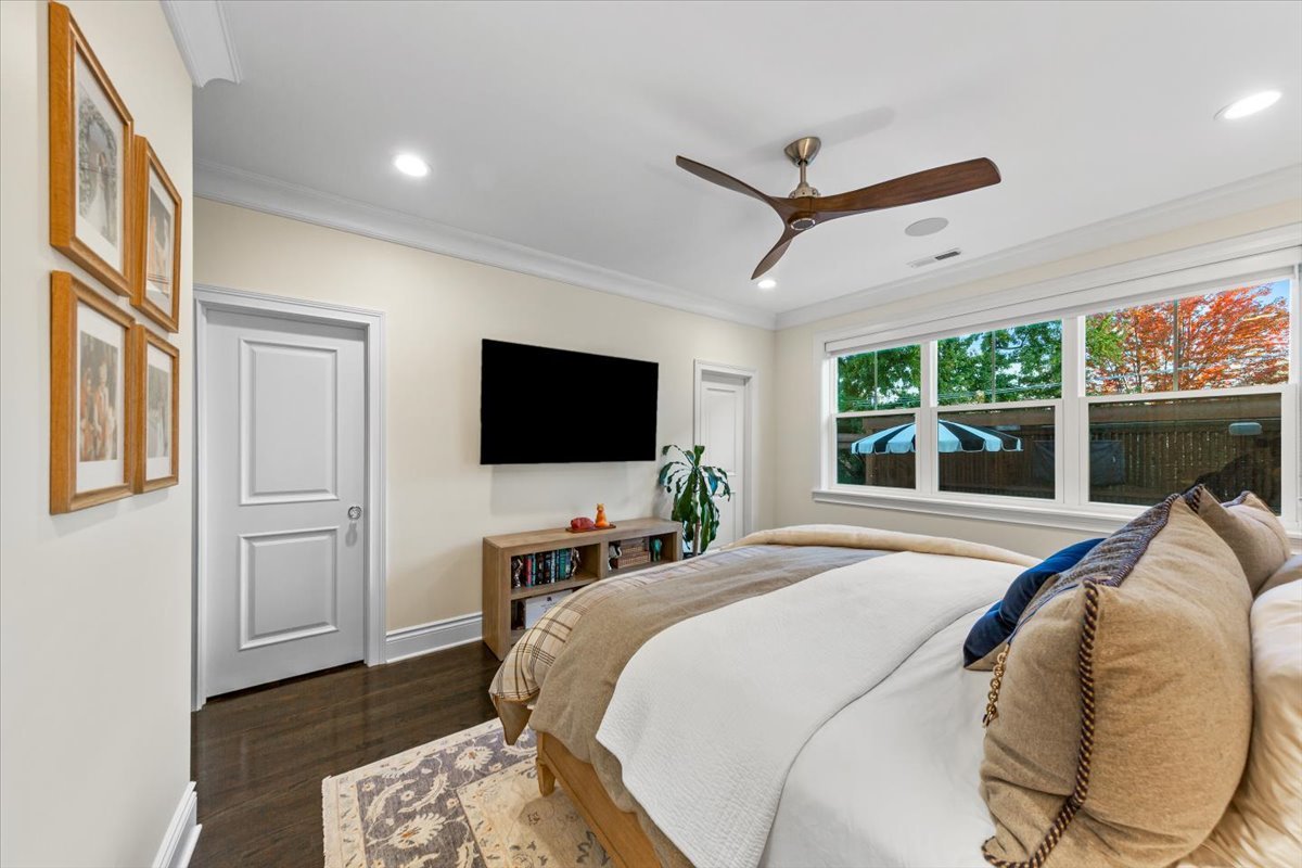 Undisclosed Address Chicago, IL 60622 - Photo 17 of 41 a bedroom with a bed and a flat screen tv