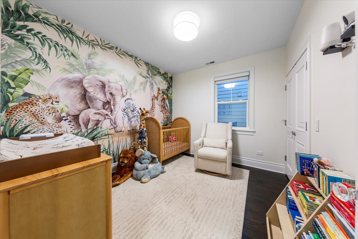 Undisclosed Address Chicago, IL 60622 - Photo 24 of 41 a bed room with a bed and a couch