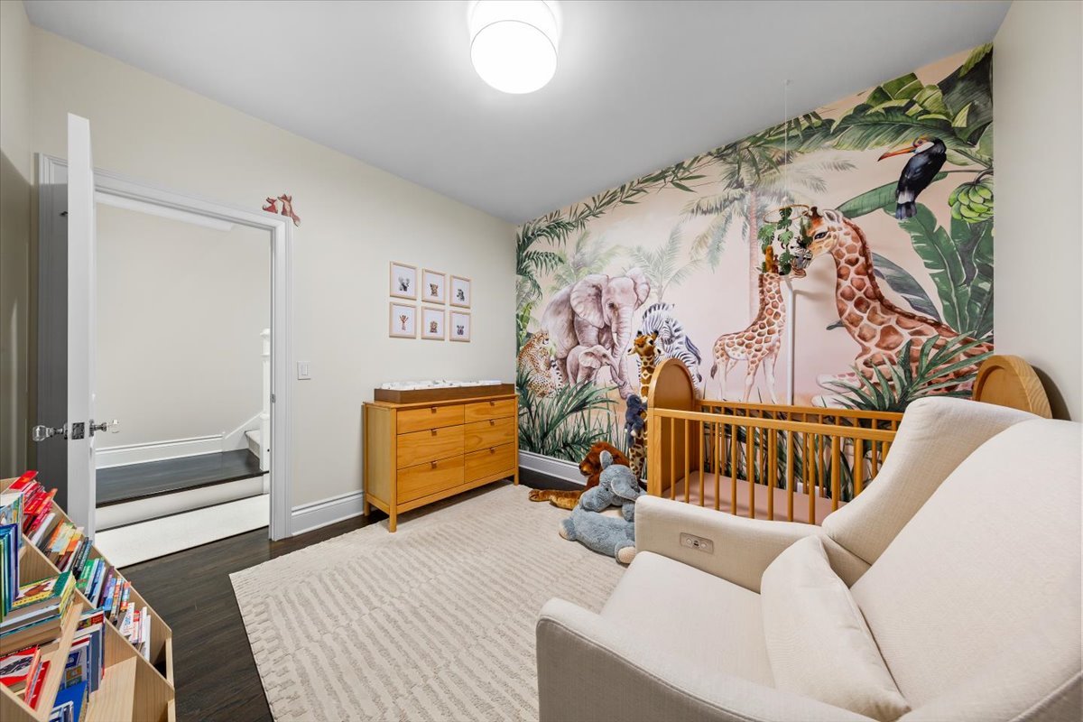 Undisclosed Address Chicago, IL 60622 - Photo 25 of 41 a bedroom with furniture and a rug