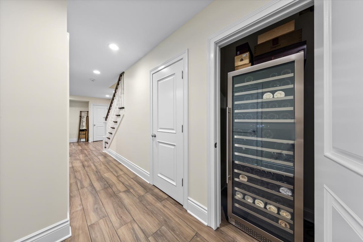 Undisclosed Address Chicago, IL 60622 - Photo 39 of 41 a view of a hallway with wooden floor and staircase