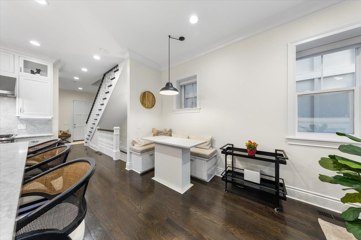 Undisclosed Address Chicago, IL 60622 - Photo 10 of 41 a living room with furniture a window and wooden floor