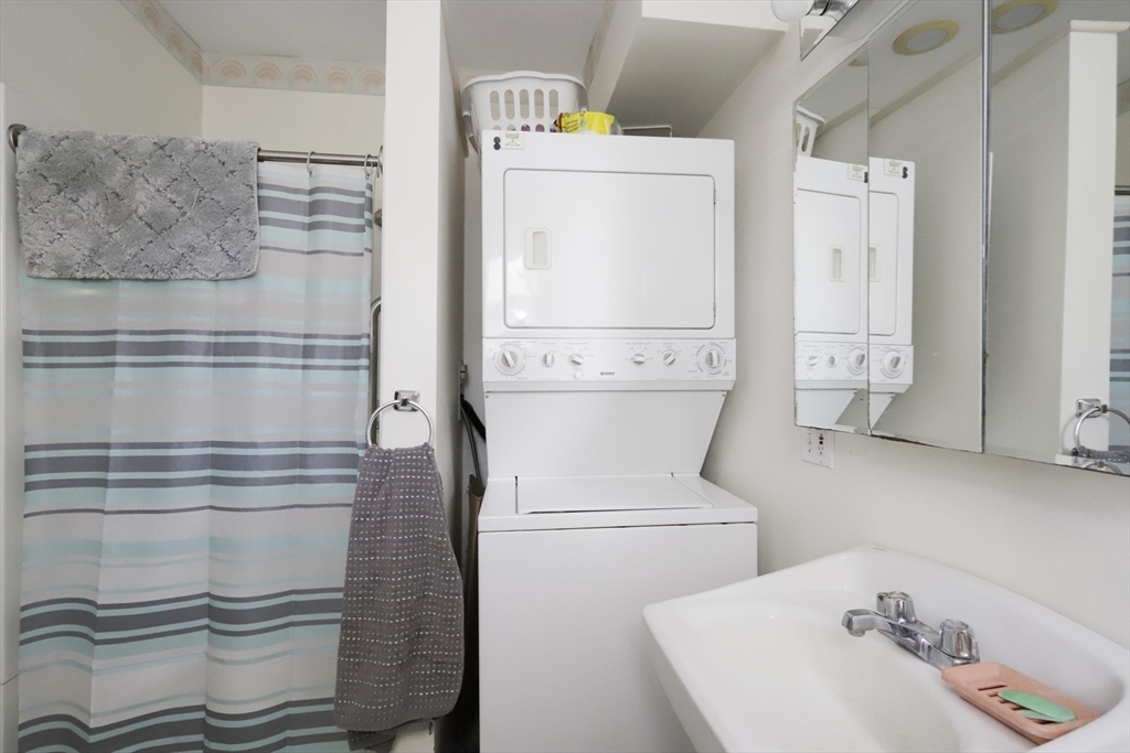 5 Anthony Street Acushnet, MA 02743 - Photo 34 of 37 a bathroom with a sink toilet and shower