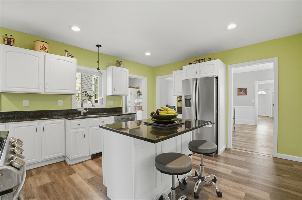 59 Cottage Street Franklin, MA 02038 - Photo 13 of 42 a kitchen with a sink appliances and cabinets