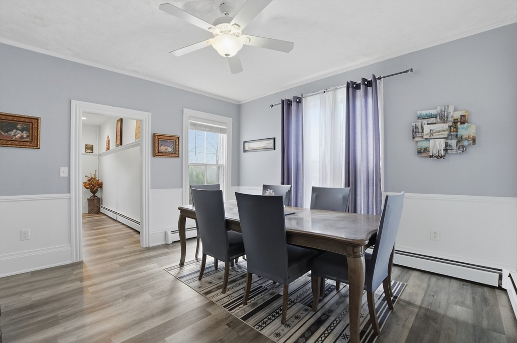59 Cottage Street Franklin, MA 02038 - Photo 17 of 42 a view of a dining room with furniture and wooden floor