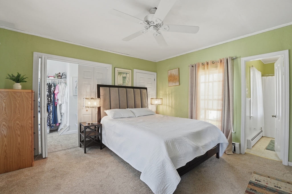 59 Cottage Street Franklin, MA 02038 - Photo 21 of 42 a bedroom with bed and a large mirror