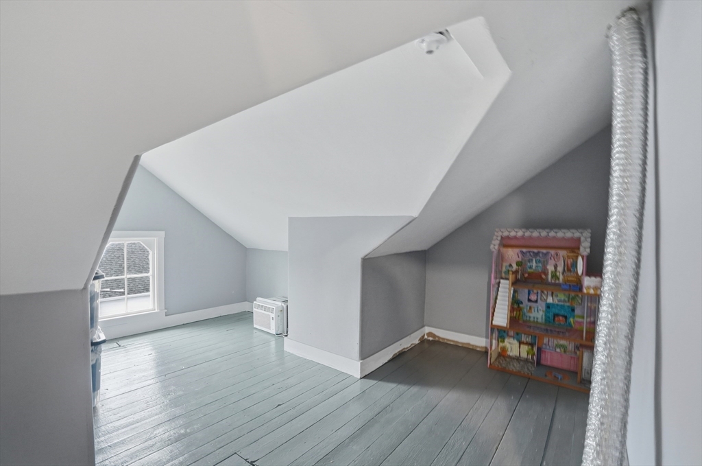 59 Cottage Street Franklin, MA 02038 - Photo 33 of 42 a view of an empty room and wooden floor
