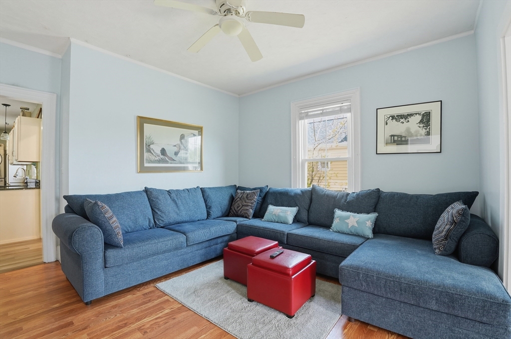 59 Cottage Street Franklin, MA 02038 - Photo 5 of 42 a living room with furniture and a couch