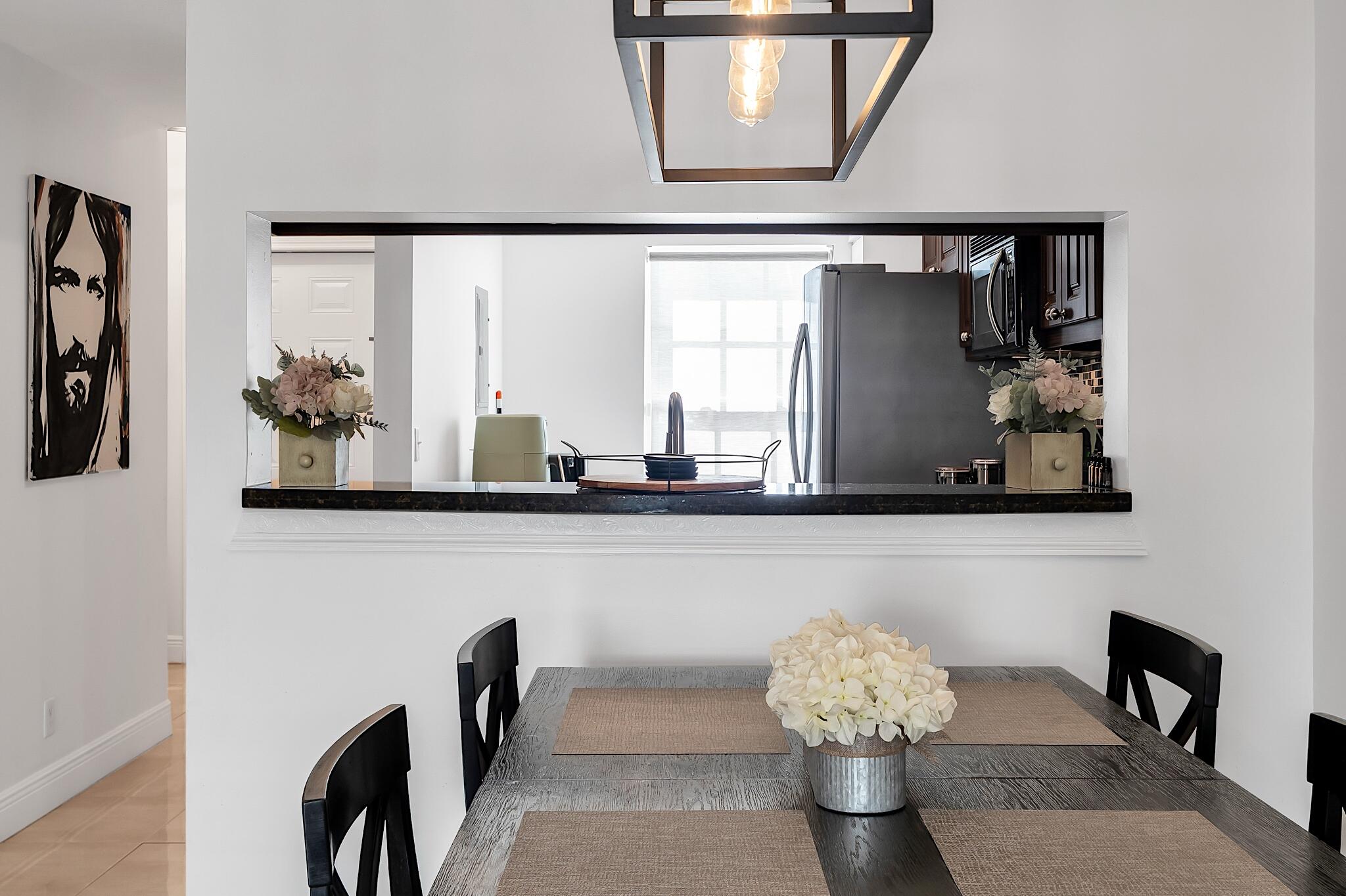 12 Fleming Court Weston, FL 33326 - Photo 18 of 51 a bathroom with a sink and a mirror