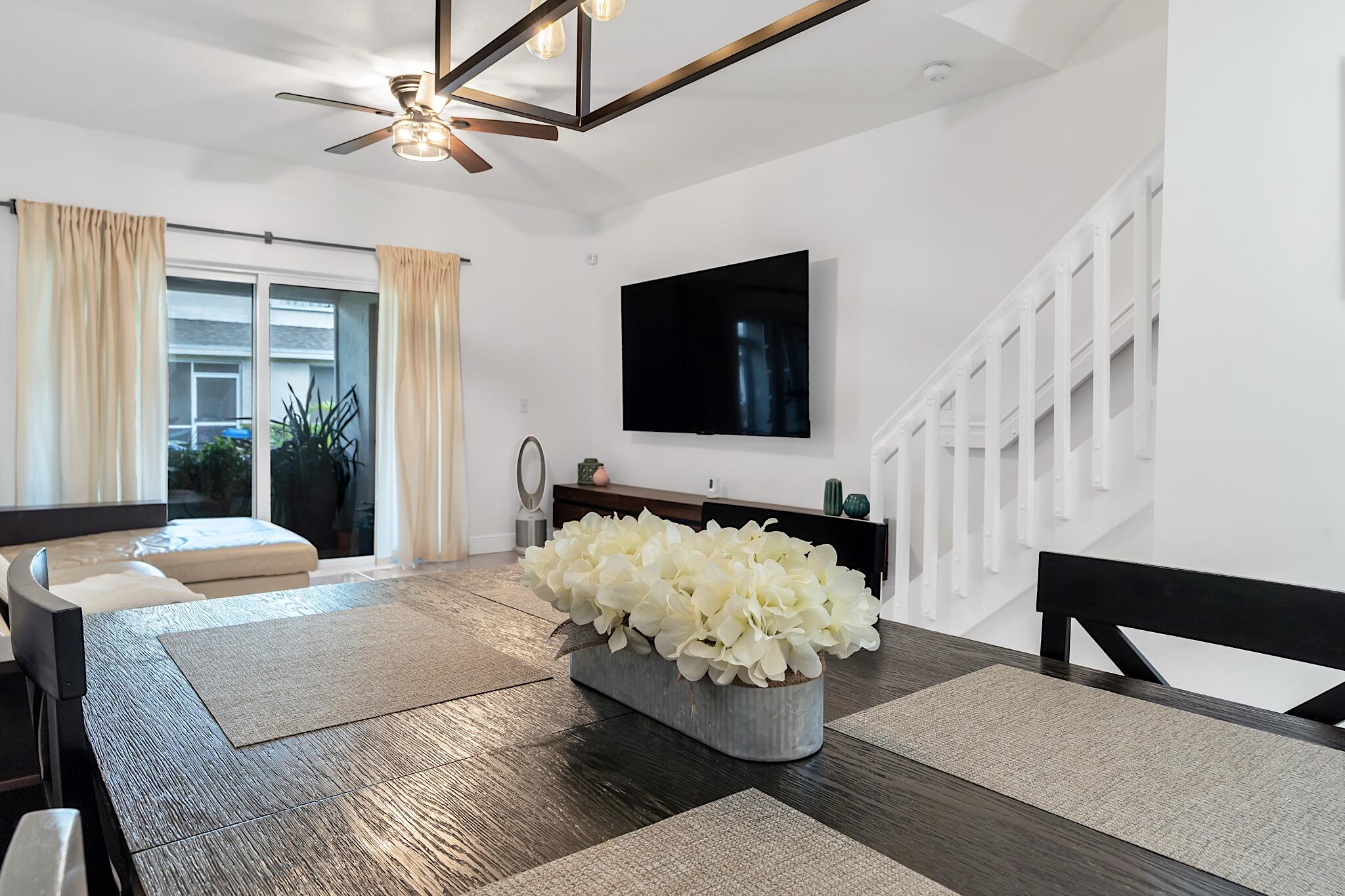 12 Fleming Court Weston, FL 33326 - Photo 19 of 51 a living room with furniture and a flat screen tv