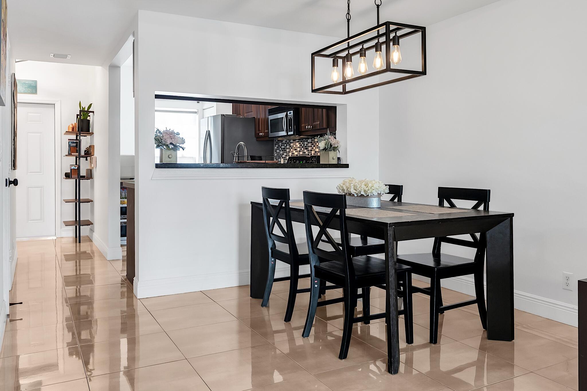 12 Fleming Court Weston, FL 33326 - Photo 20 of 51 a view of a dining room with furniture