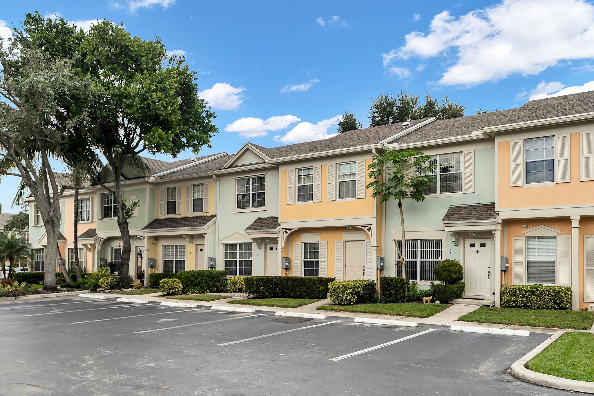 12 Fleming Court Weston, FL 33326 - Photo 3 of 51 a front view of a residential houses with yard