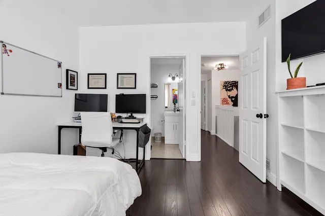 a bathroom with a toilet and a sink