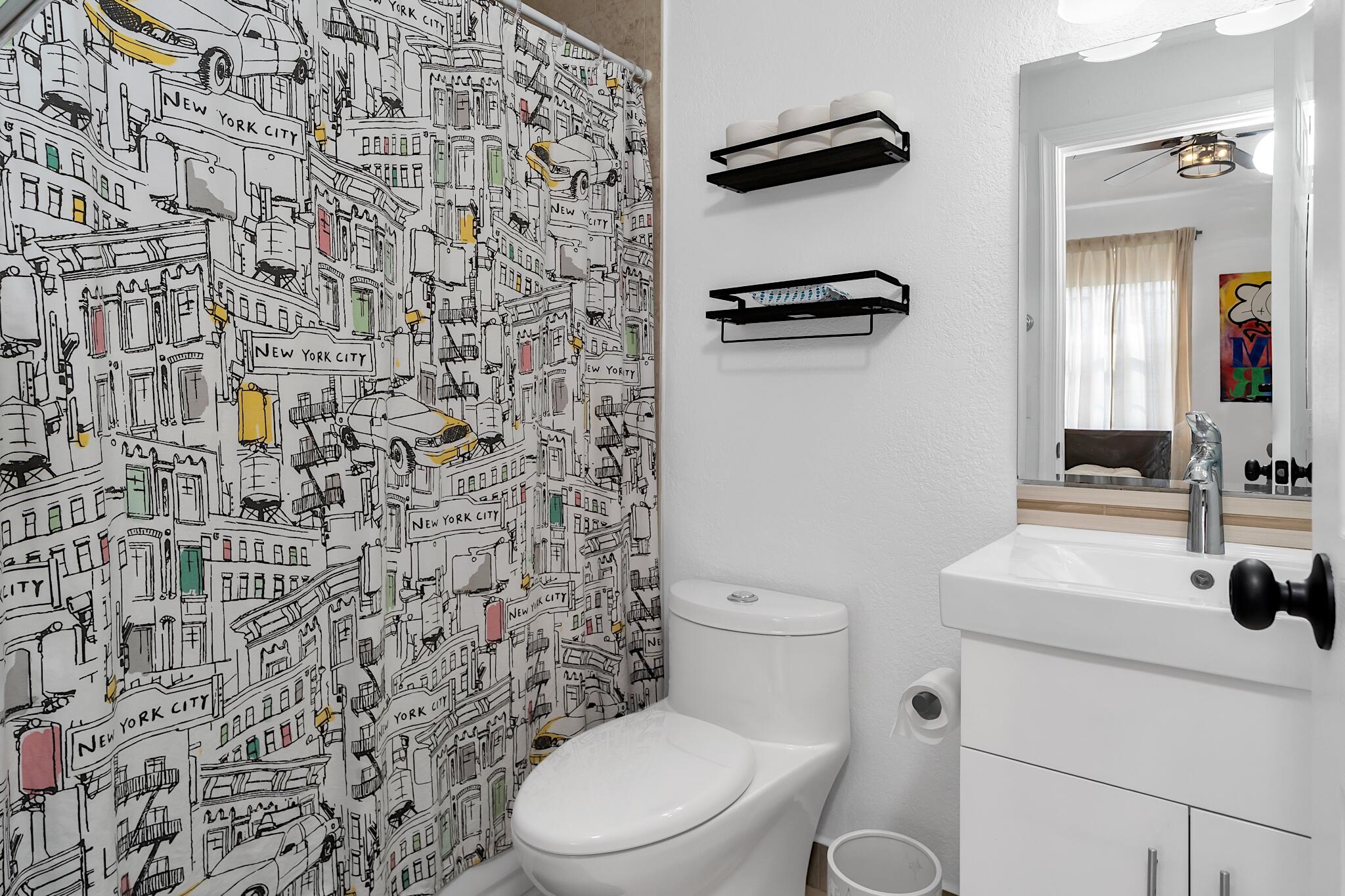 12 Fleming Court Weston, FL 33326 - Photo 33 of 51 a bathroom with a toilet and a sink