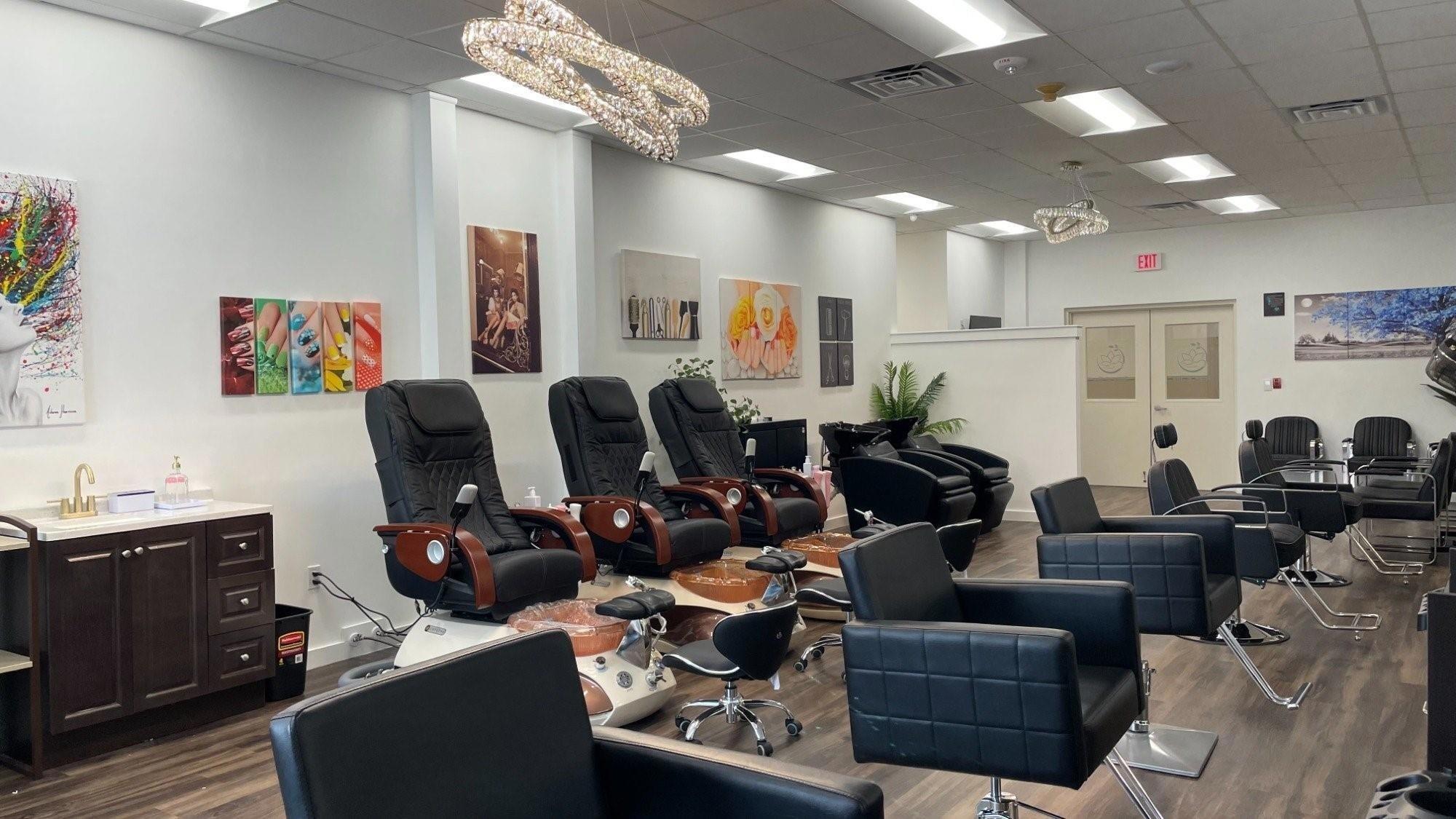 12 Fleming Court Weston, FL 33326 - Photo 44 of 51 a living room with furniture and a chandelier