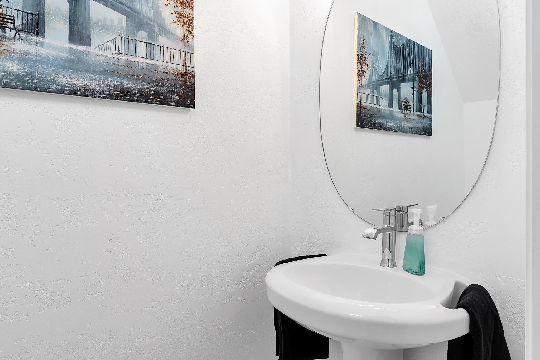 12 Fleming Court Weston, FL 33326 - Photo 7 of 51 a bathroom with a sink and a mirror