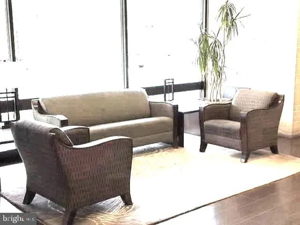 a view of a small space with wooden floor