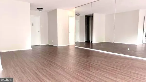 a view of a living room and dining room