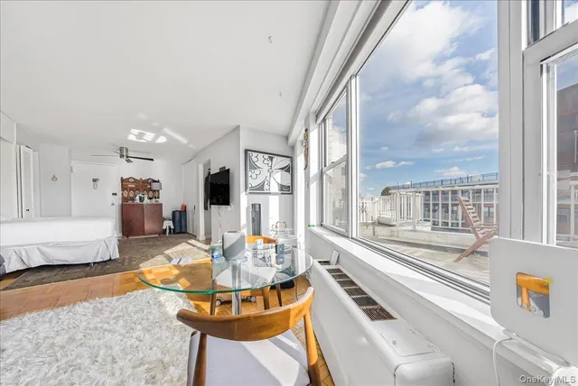a spacious bathroom with a bathtub and a shower
