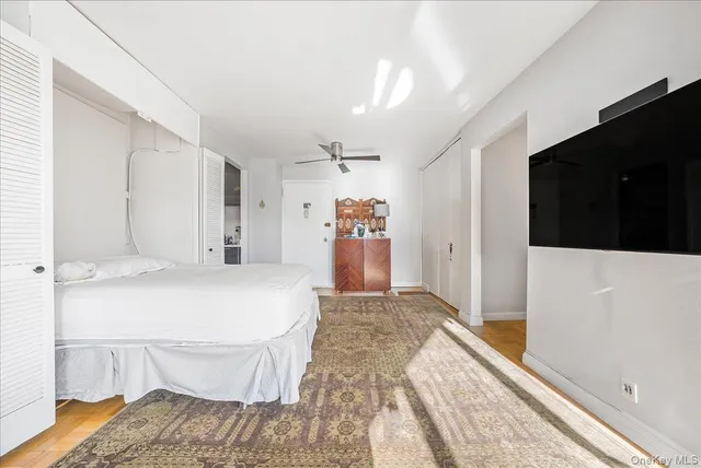 a kitchen with cabinets and a stove