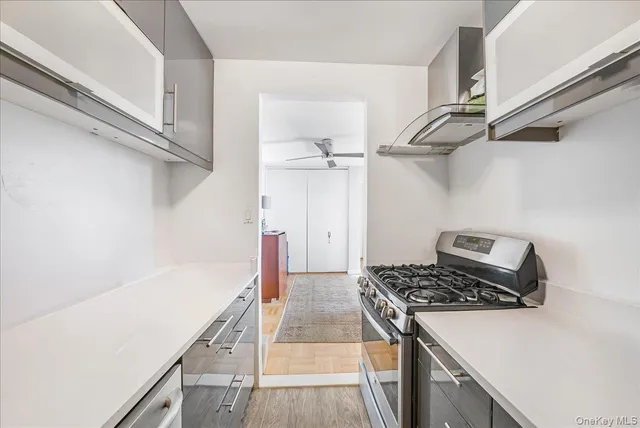 a bathroom with a sink a toilet and bathtub