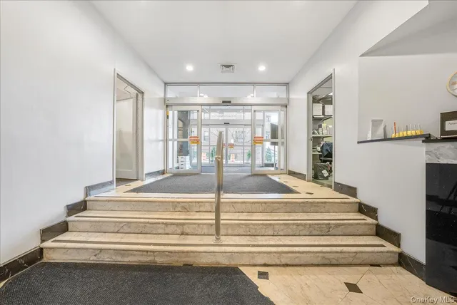 a living room with furniture and flat screen tv