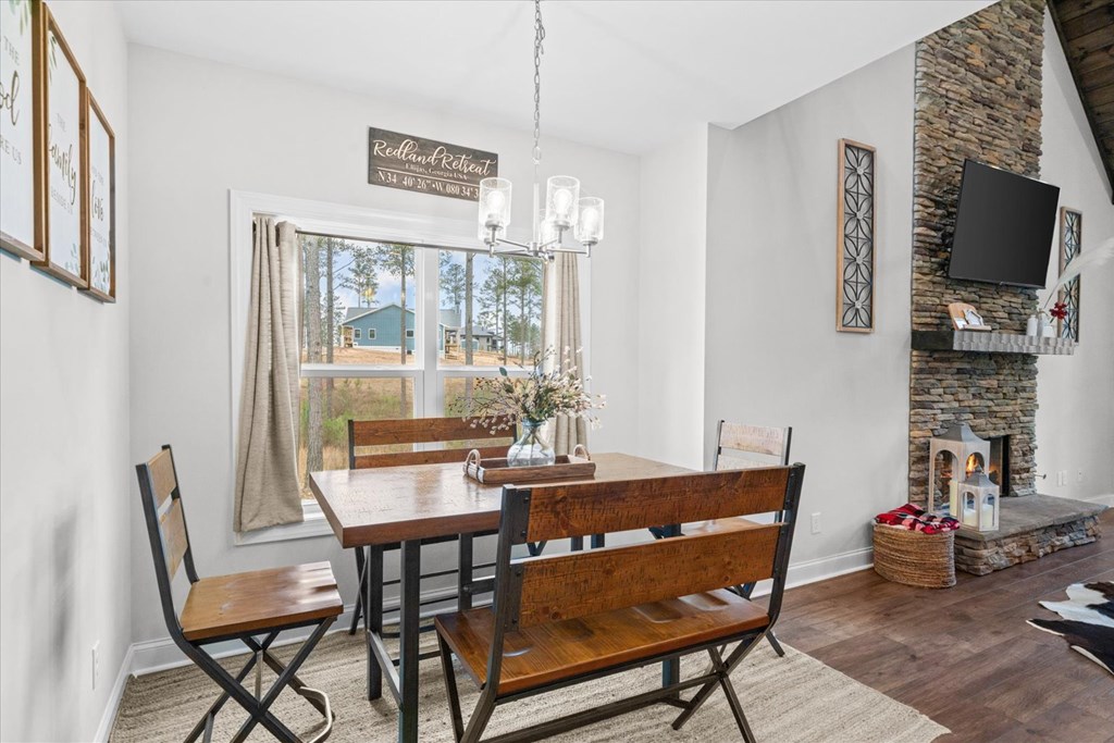 1068 High River Road Ellijay, GA 30540 - Photo 14 of 59 a view of a dining room with furniture window and outside view