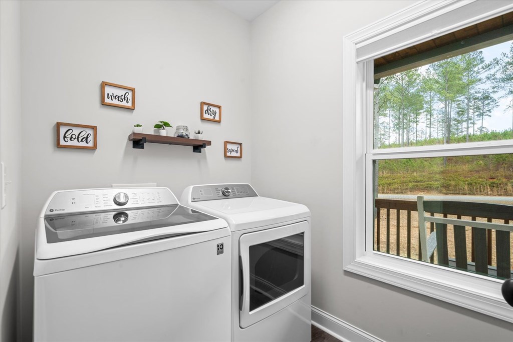 1068 High River Road Ellijay, GA 30540 - Photo 34 of 59 a utility room with dryer and washer