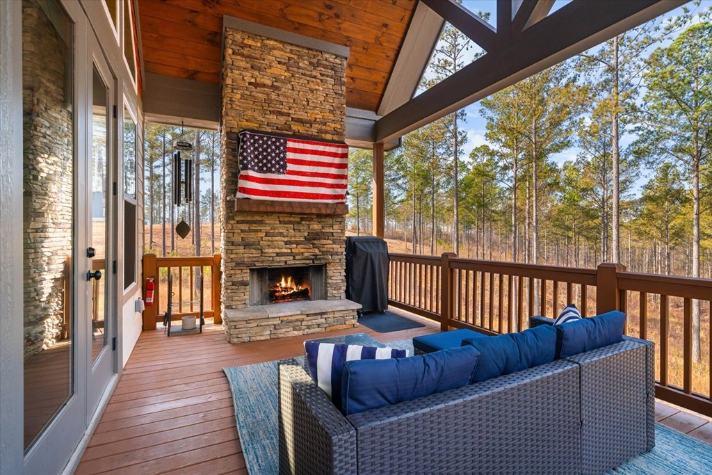 1068 High River Road Ellijay, GA 30540 - Photo 48 of 59 a balcony view with a fireplace and wooden floor