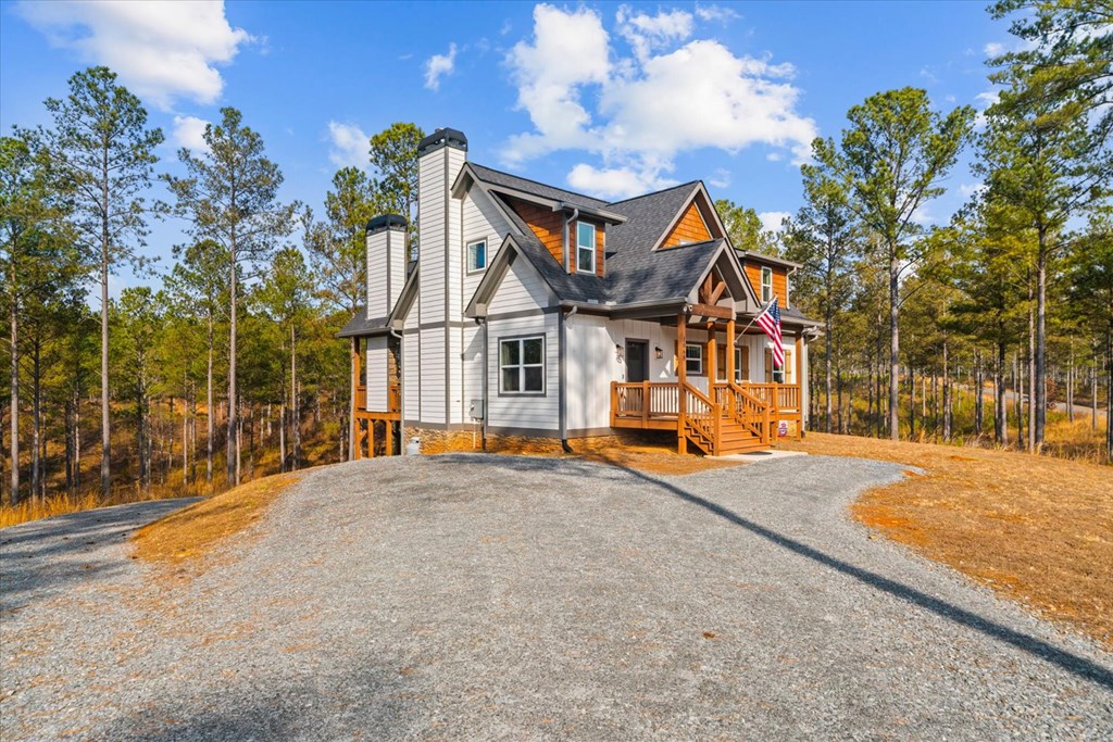 1068 High River Road Ellijay, GA 30540 - Photo 6 of 59 a view of a house with basketball court