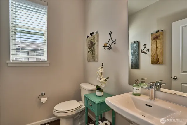 a bathroom with a sink and a toilet