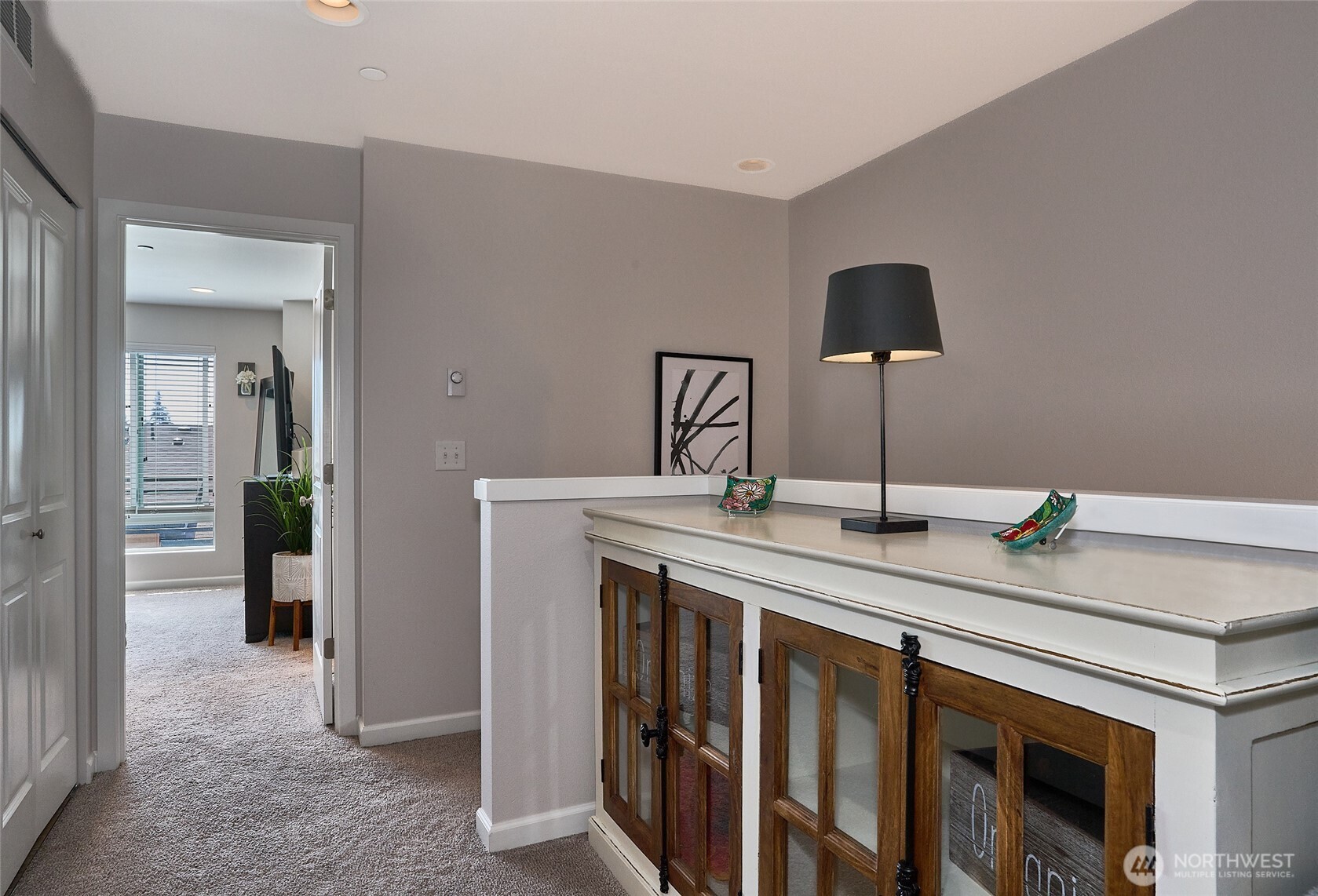 13146 83rd Lane South Seattle, WA 98178 - Photo 20 of 22 a kitchen with stainless steel appliances granite countertop a sink and a refrigerator