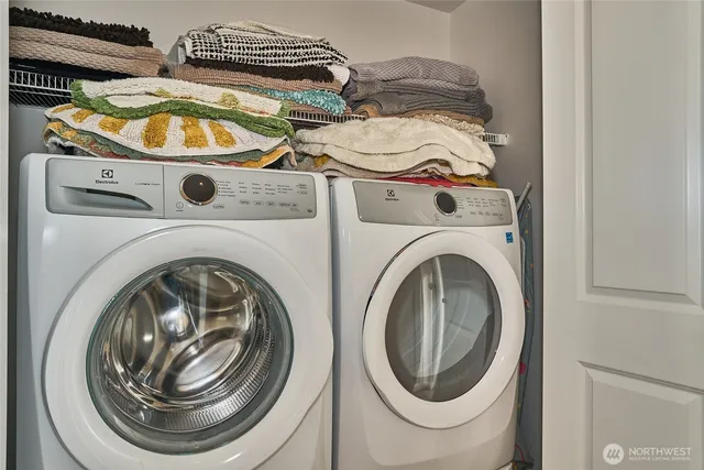 a utility room with dryer and washer