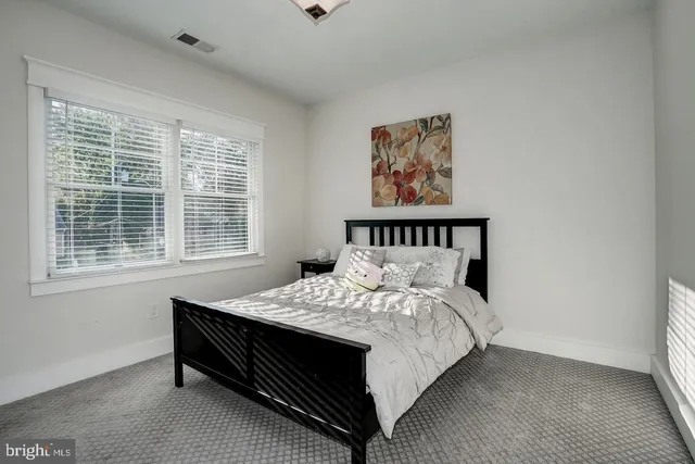 a living room with furniture and window