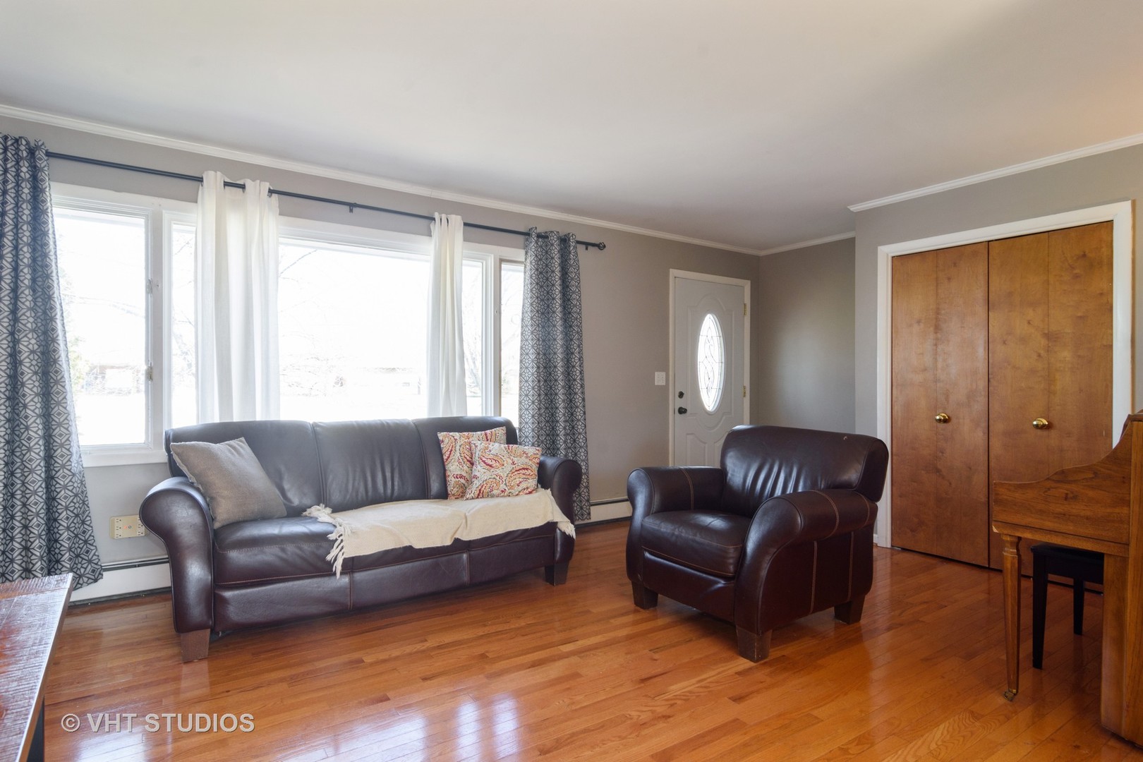 49 Miller Road Lake Zurich, IL 60047 - Photo 2 of 19 a living room with furniture and a window
