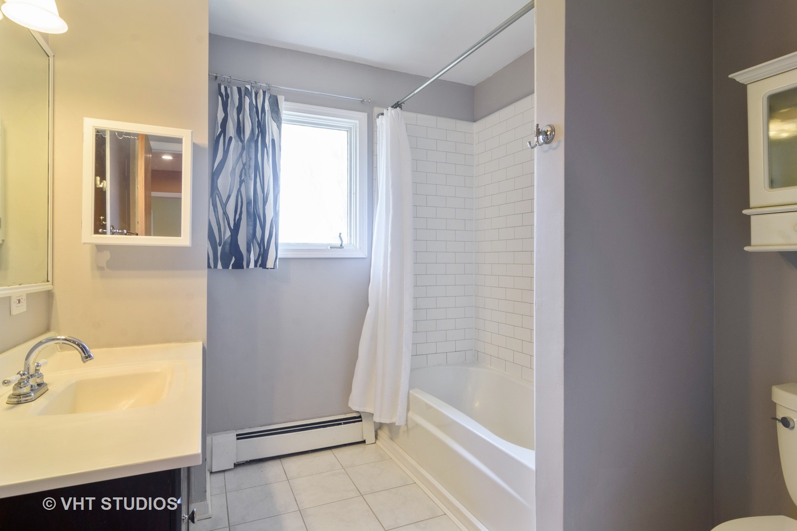 49 Miller Road Lake Zurich, IL 60047 - Photo 15 of 19 a bathroom with a shower and a sink