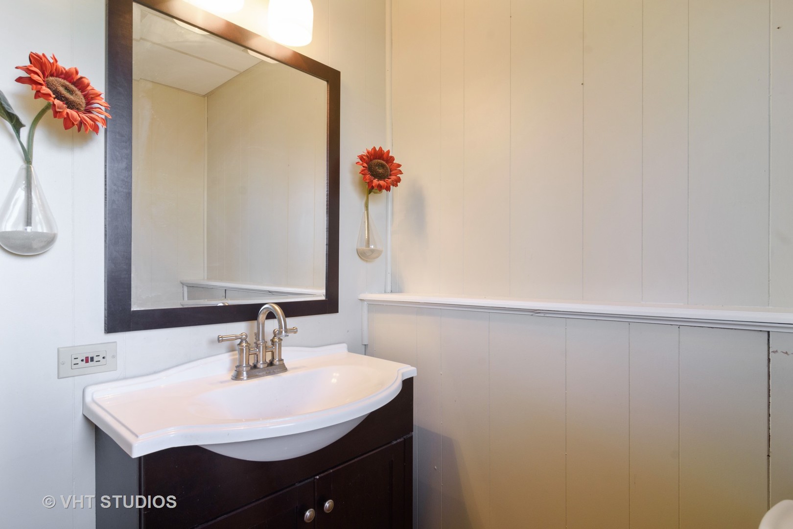 49 Miller Road Lake Zurich, IL 60047 - Photo 16 of 19 a bathroom with a sink and a mirror